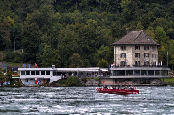 Excursion boat with tourists, Rhine Falls Schaffhausen, waterfall, Panoramarestaurant Schlössli Wörth, Neuhausen, Canton Schaffhausen, Switzerland