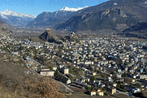 The town of Sion in the Rhone Valley with the two castles Tourbillon, left, and Valere, right, Sion, Valais, Switzerland