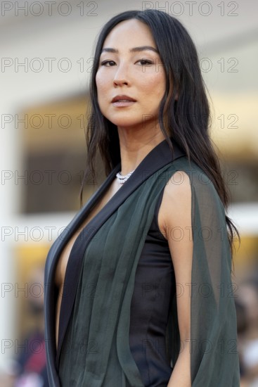 Venice, Italy - 2 September 2025: Greta Lee during the red carpet of - A house of Dynamite - during the 82nd Venice International Film Festival