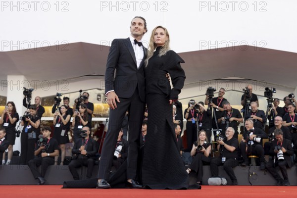 Venice, Italy - 2 September 2025: Rory St. Clair Gainer, Rebecca Ferguson during the Red Carpet of - A house of Dynamite - during the 82nd Venice International Film Festival