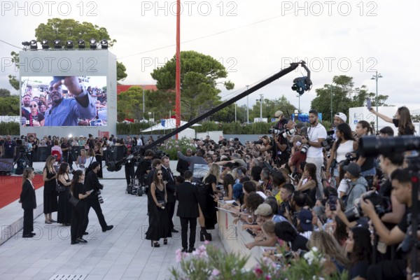 Venice, Italy - 2 September 2025: Fans during the red carpet of - A house of Dynamite - during the 82nd Venice International Film Festival