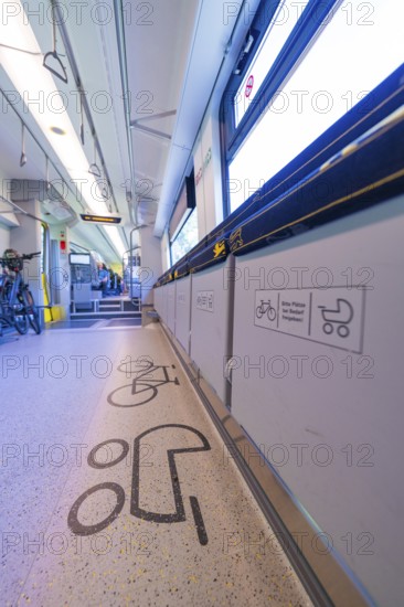 Train interior with bicycle compartment and special floor markings, battery Electric train with green electricity, Siemens Mireo Plus B, Freudenstadt, Germany