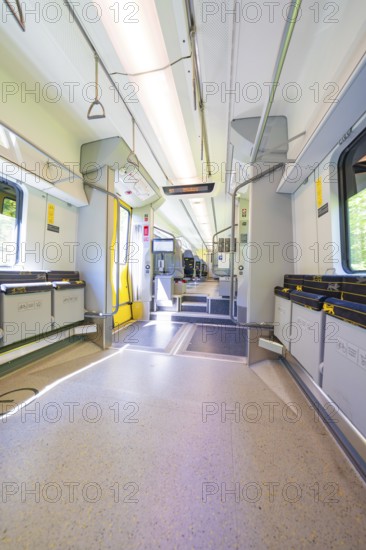 Interior of a modern vehicle with empty seats and large windows, battery Electric train powered by green electricity, Siemens Mireo Plus B, Freudenstadt, Germany