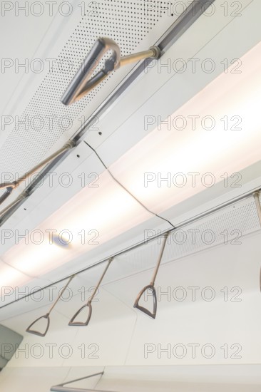 Ceiling view with lighting and grab handles in a modern vehicle, battery Electric train with green electricity, Siemens Mireo Plus B, Freudenstadt, Germany