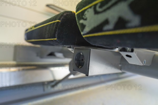 Detail of a modern seat with socket in the interior of a vehicle, battery Electric train with green electricity, Siemens Mireo Plus B, Freudenstadt, Germany