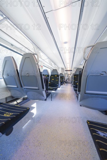 Spacious and bright train interior with modern seating arrangements, battery Electric train with green electricity, Siemens Mireo Plus B, Freudenstadt, Germany