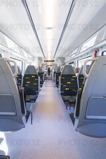 Interior view of a modern train with double-row seating arrangement, battery Electric train with green electricity, Siemens Mireo Plus B, Freudenstadt, Germany