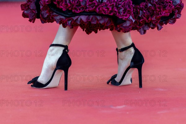 Venice, Italy - 1 September 2025: Close up of dress and high heels during the red carpet of - The Smashing Machine - during the 82nd Venice International Film Festival