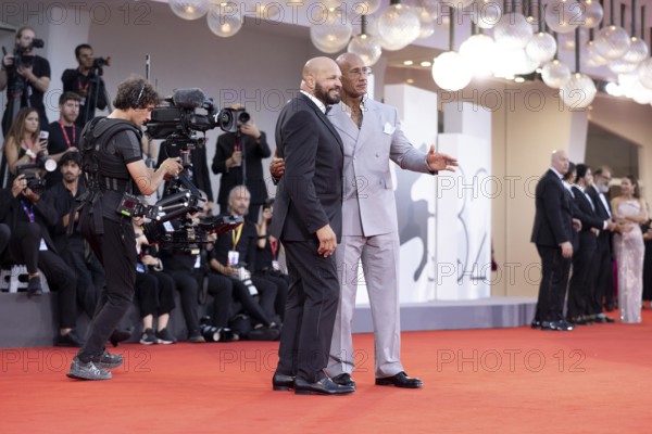 Venice, Italy - 1 September 2025: Mark Kerr and Dwayne Johnson during the red carpet of - The Smashing Machine - during the 82nd Venice International Film Festival