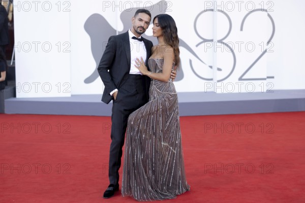 Venice, Italy - 3 September 2025: Pietro Tartaglione and Rosa Perrotta during the red carpet of - Duse - during the 82nd Venice International Film Festival