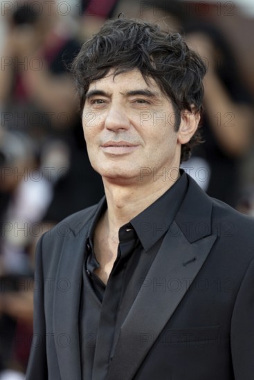 Venice, Italy - 3 September 2025: Pietro Marcello during the red carpet of - Duse - during the 82nd Venice International Film Festival