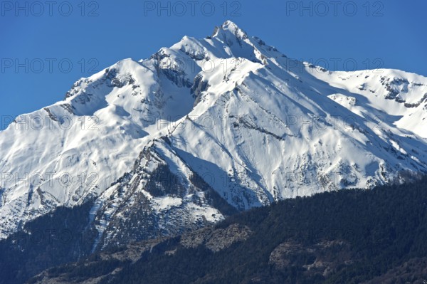 Snow-covered mountain range Haut de Cry, Chamoson, Valais, Switzerland