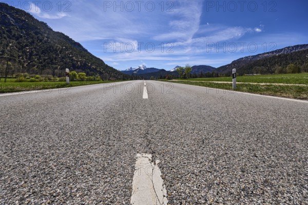 Road, centre line, delineator, mountain landscape, mountains, hills, footpath and cycle path, forest, meadow, frog's-eye view, blue sky, cirrostratus clouds, federal road 20, Reichenhaller Straße, Bischofswiesen, Berchtesgadener Land district, Bavaria, Germany