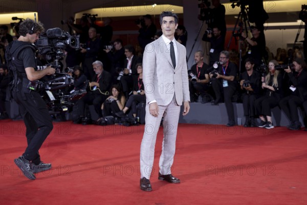 Venice, Italy - 3 September 2025: Louis Cancelmi during the red carpet of - Cartier Glory To The Filmmaker Award 2025 and In the Hand of Dante - during the 82nd Venice International Film Festival