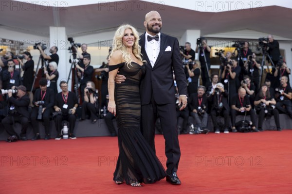 Venice, Italy - 1 September 2025: Franci Alberding Kerr and Mark Kerr during the Red Carpet of - The Smashing Machine - during the 82nd Venice International Film Festival