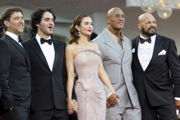 Venice, Italy - 1 September 2025: Emily Blunt, Benny Safdie, Andrea Romeo, David Koplan, Dwayne Johnson, Hiram Garcia and Mark Kerr during the Red Carpet of - The Smashing Machine - during the 82nd Venice International Film Festival