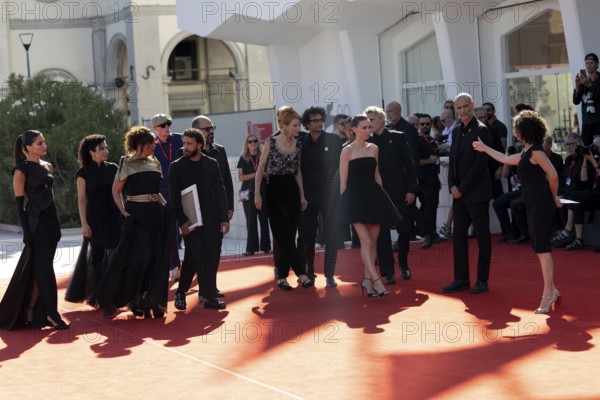 Venice, Italy - 3 September 2025: The cast with Nadim Cheikhrouha, Odessa Rae, James Wilson, Joaquin Phoenix, Rooney Mara, Kaouther Ben Hania, Motaz Malhees, Clara Khoury and Saja Kilani during the Red Carpet of - The Voice Of Hind Rajab - during the 82nd Venice International Film Festival