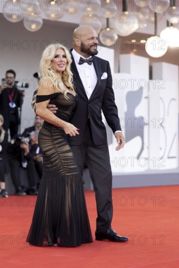 Venice, Italy - 1 September 2025: Franci Alberding Kerr and Mark Kerr during the Red Carpet of - The Smashing Machine - during the 82nd Venice International Film Festival