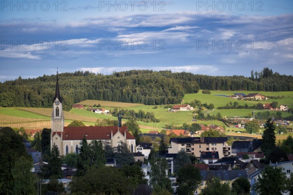 View from a hill to St. Konrad Catholic Church, Grosswangen, Canton Lucerne, Switzerland