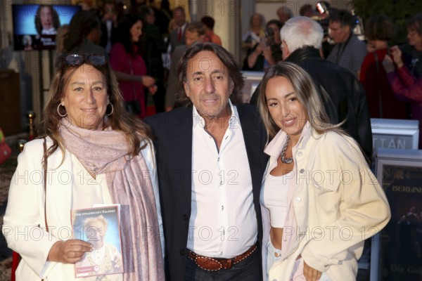 Dieter Landuris with his woman Natascha Landuris (l) and daughter Isabella Luna Landuris (r) - Premiere of The Imaginary Invalid based on The Imaginary Invalid by Molière / Dieter Hallervorden's 90th birthday, Berlin, 05.9.25