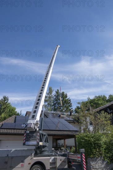 Installation of a large skylight with the help of a mobile crane, Bavaria, Germany