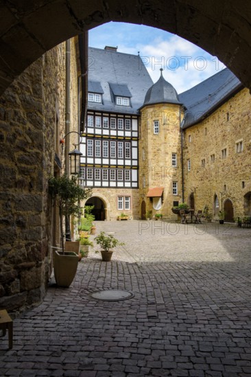 View through the castle gate into the inner courtyard of Spangenberg Castle, Spangenberg, Schwalm-Eder-Kreis, Hesse, Germany