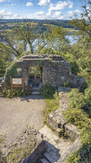 Bird's eye view of rest of wall with window niche part of ruins of Isenburg Castle, below old staircase to entrance of former residential building residential wing residential building in the background Lake Baldeney, Schellenberger Wald, Essen, North Rhine-Westphalia, Germany