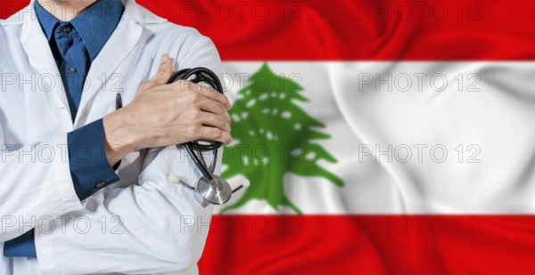 Doctor with stethoscope on Lebanon flag. Doctor holding stethoscope on Lebanon flag