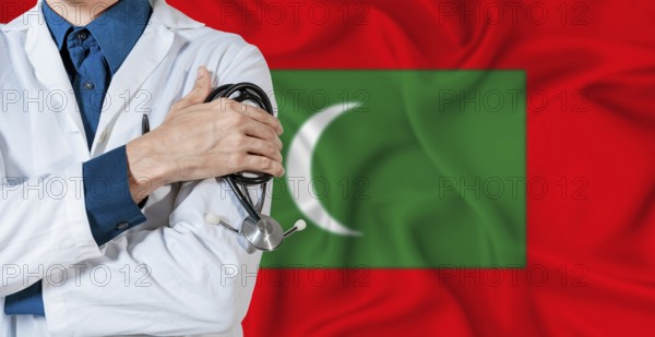 Doctor with stethoscope on Maldives flag. Doctor holding stethoscope on Maldives flag