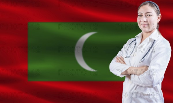 Female doctor on Maldives flag. Doctor with crossed arms on Maldives flag. Maldives health and care concept