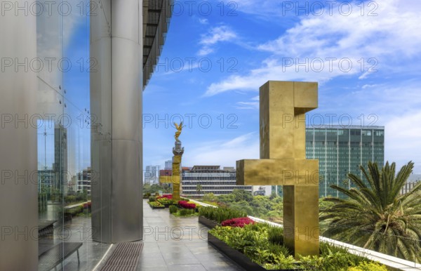 Mexico City tourist attraction Angel of Independence column near financial center and El Zocalo