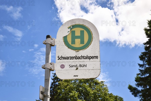 Forbach, Germany - July 13th 2025: Bus stop sign for tourist attraction Bus stop sign Schwarzenbachtalsperre in Black Forest. Public transport access to Schwarzenbach Dam and hiking area