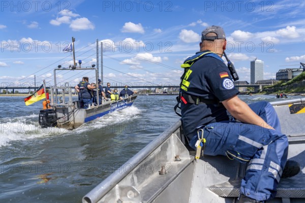 THW multi-purpose boats during a training trip on the Rhine, near Düsseldorf, of the Water Hazards Section, this type of boat is used to transport people and goods as a rescue boat and as a working platform, during the major exercise FÜLEX25, lasting several days, of the THW, Technical Relief Organisation, North Rhine-Westphalia Regional Association, over 3500 volunteers from the 127 North Rhine-Westphalia local associations practise many different deployment scenarios over 4 weekends