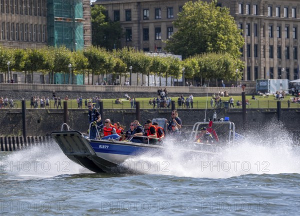 Multi-purpose boat of the THW during a training trip on the Rhine near Düsseldorf, the specialist group for water hazards, this type of boat is used to transport people and goods as a rescue boat and as a working platform, during the major exercise FÜLEX25, lasting several days, of the THW, Technical Relief Organisation, North Rhine-Westphalia regional association, over 3500 volunteers from the 127 North Rhine-Westphalia local associations practise many different deployment scenarios over 4 weekends