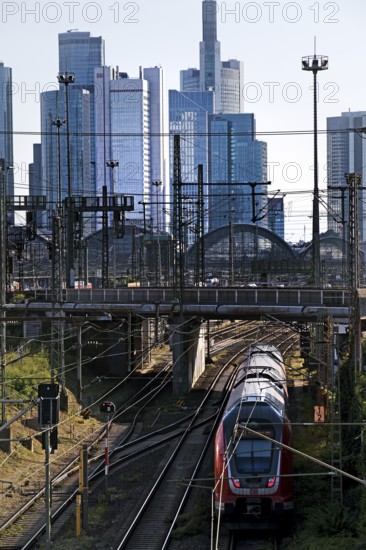 Elevated city view with regional train and skyscrapers, Frankfurt am Main, Hesse, Germany