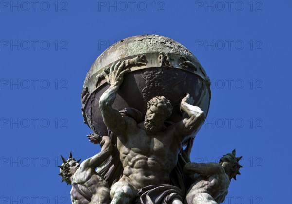 Atlas, carrying the globe, supported by steam and electricity by Gustav Herold, main railway station, Frankfurt am Main, Hesse, Germany