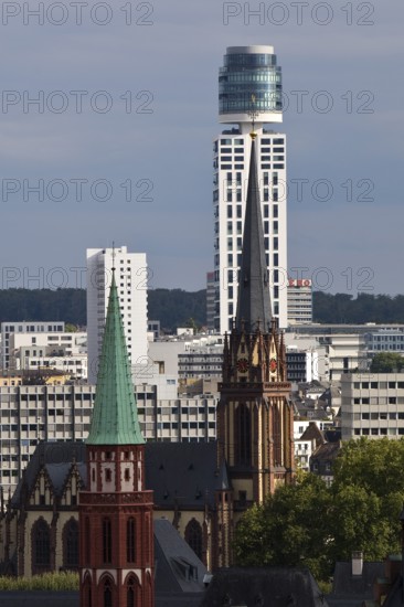 Tower of the old Protestant Church of St Nicholas, the Protestant Church of the Epiphany and the New Henninger Tower, Frankfurt am Main, Hesse, Germany