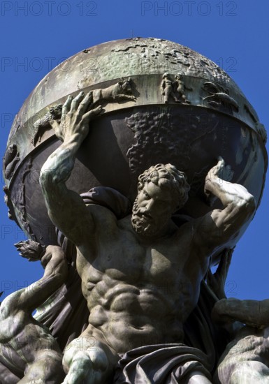 Atlas, carrying the globe, supported by steam and electricity by Gustav Herold, main railway station, Frankfurt am Main, Hesse, Germany