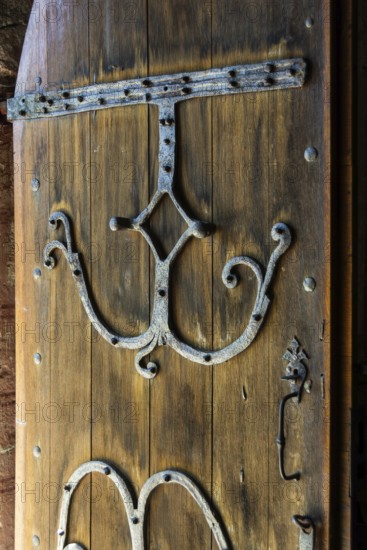 Compains, ironwork detail on the entrance door, Saint Georges church, Auvergne Volcanoes Regional Park, Cezallier region, Puy de Dome, Auvergne Rhone Alpes, France