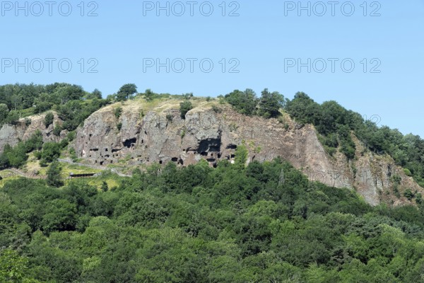 Jonas caves are nestled on a rocky cliff near Saint Pierre Colamine, Puy de Dome in Auvergne, France