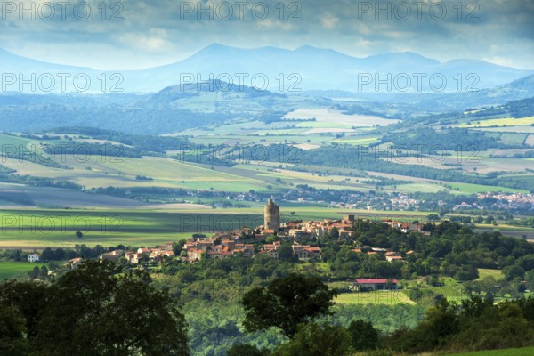 Village of Montpeyroux labelled Les Plus Beaux Villages de France and view on Sancy massif, Puy de Dome, Auvergne-Rhone-Alpes, France