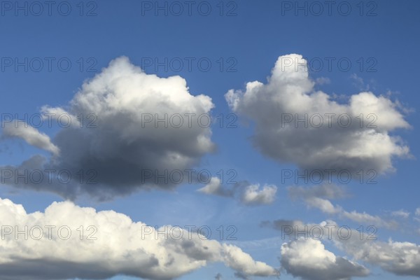Photo from above two altocumulus clouds cluster clouds below in the background white stratocumulus cumulus clouds cloud in front of bright blue sky, international