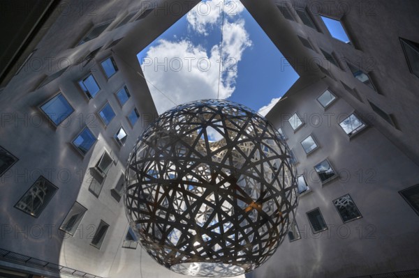 Steel sphere, Sphere, a work of art by Ólafur Eliasson, Fünf Höfe shopping arcade, Munich, Bavaria, Germany