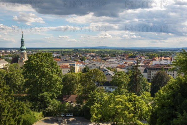 View over Baden with church tower under cloudy sky, Baden, Lower Austria, Austria