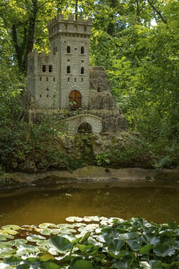 Water lily pond with bee castle in the spa gardens of Baden, Lower Austria, Austria