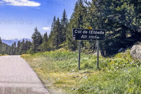 Sign at the top of the Col de l'Echelle Echelle Alpine pass with altitude indication 1762 m metres, Département Hautes-Alpe, France