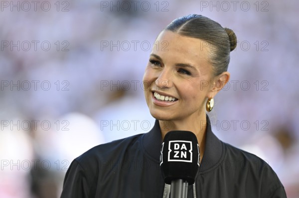 DAZN presenter Laura Wontorra, smiling in interview microphone microphone logo portrait, Bundesliga, MHPArena, MHP Arena Stuttgart, Baden-Württemberg, Germany