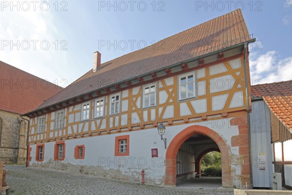 Protestant vicarage with archway, half-timbered house, Heldburg, Thuringia, Germany