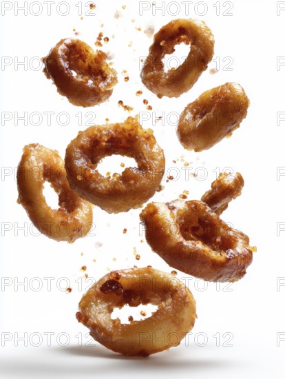 Deep-fried, greasy, squid rings, calamari, fall on the background against a white background, crispy and appetising, symbolic image for unhealthy nutrition, fast food, snack bar, street food, saturated fatty acids, acrylamide, AI generated