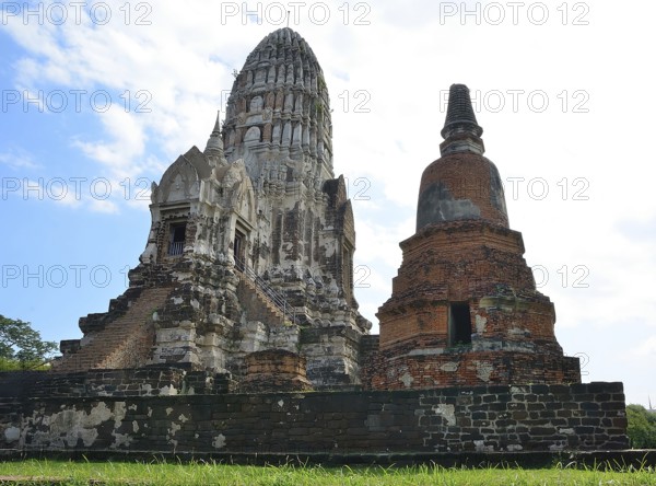 Crumbling ancient buddhist temple wat ratchaburana with ornate prang and damaged stupa, displaying rich history and architecture, located in ayutthaya, thailand